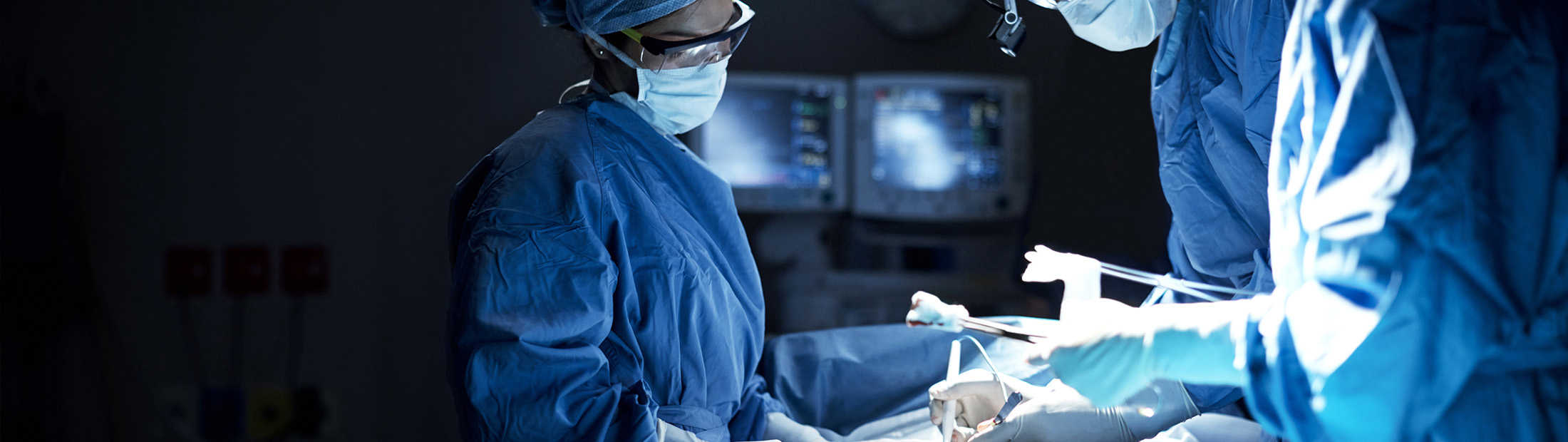 Surgeons perform an operation. Getty Images.