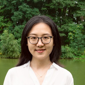 Jiacheng Liu smiles and poses for a portrait.