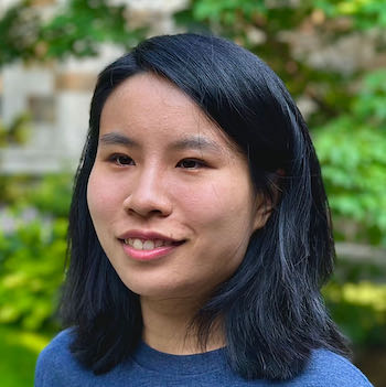 Chenfei Li smiles and poses for a portrait.