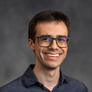 Gabriel Ponte smiles and poses for a portrait.