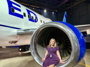 Person sitting in an airplane engine