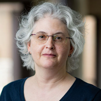 Marina Epelman smiles and poses for a portrait.